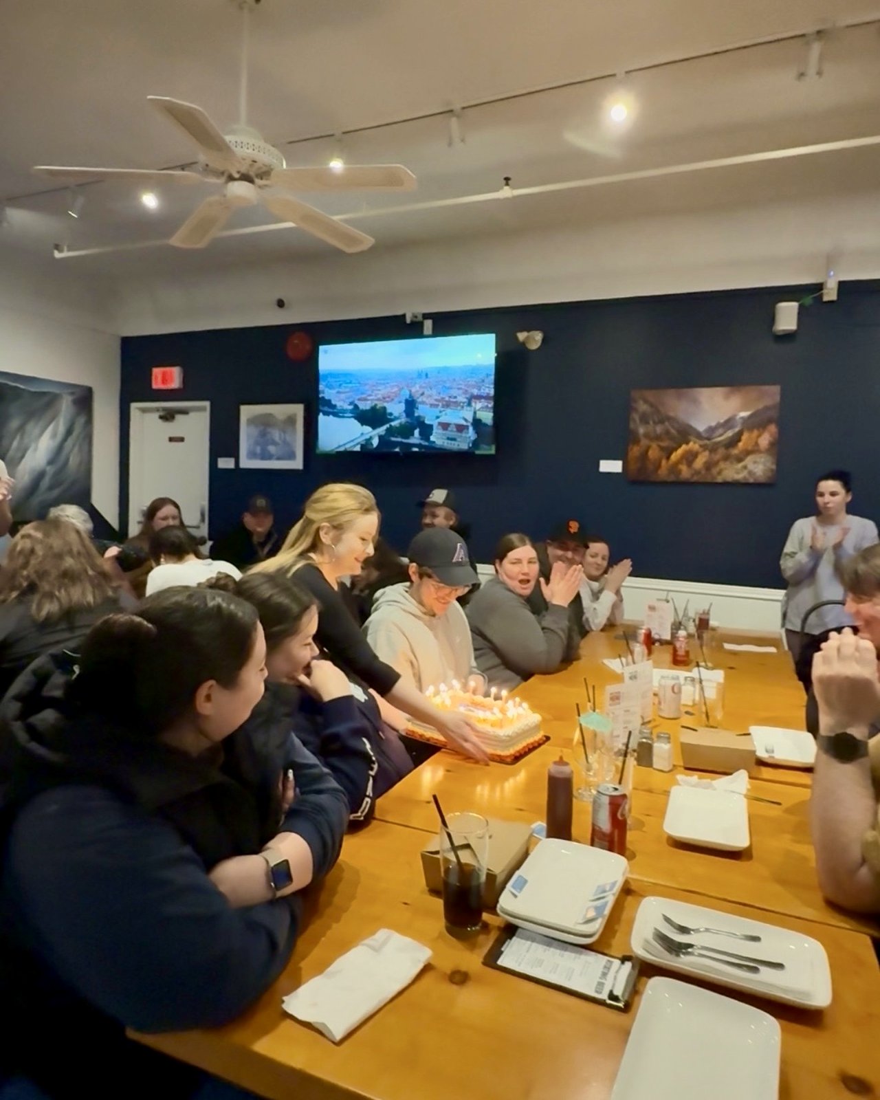OV Burger Bar staff celebrate a team birthday in the dining room, OV Burger Bar Prince Rupert